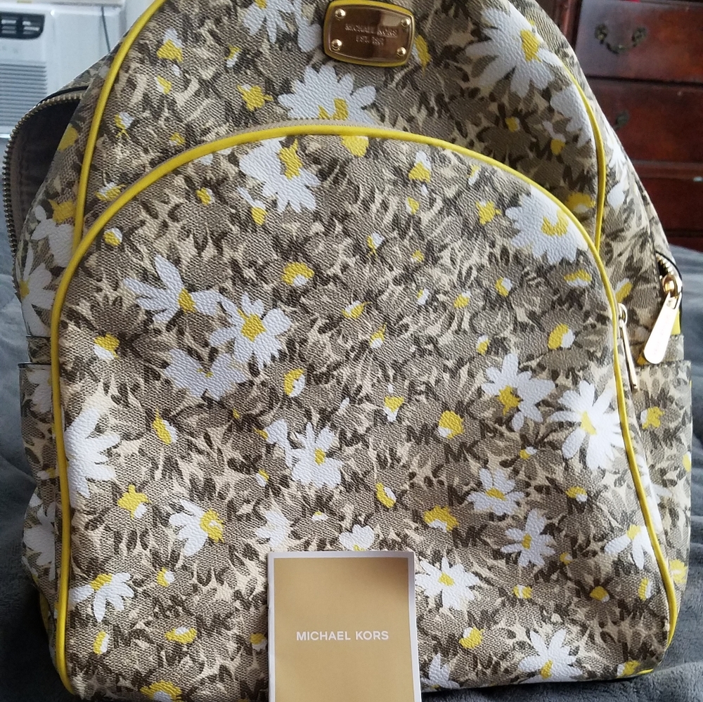 Michael Kors bookbag.